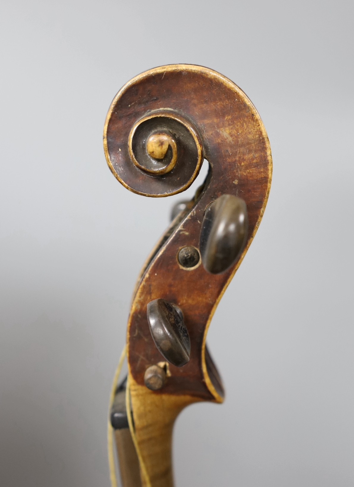 A cased German violin, labelled Stradivarius and dated 1886, back measures 36cm excl button